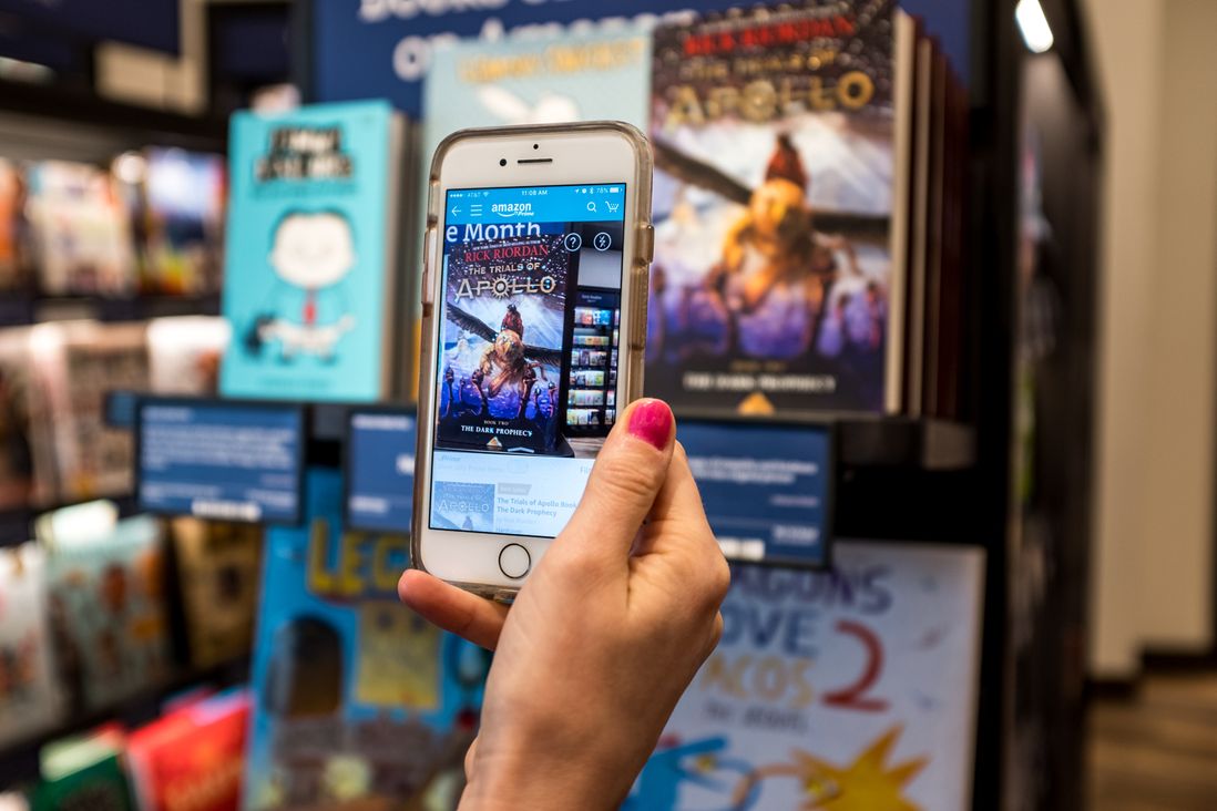 You can scan book covers with the Amazon app to find out the price<br>